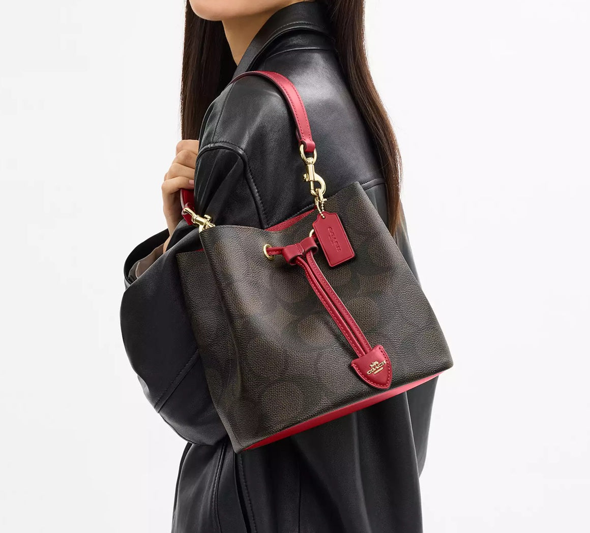Rowan Bucket Bag In Maxi Signature Canvas Walnut Red Coach