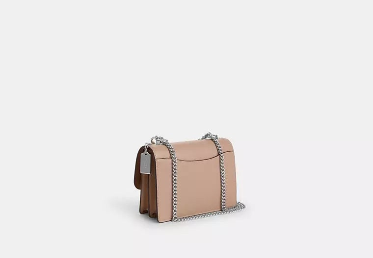 Klare Crossbody Bag In Signature Canvas Sand Taupe Coach