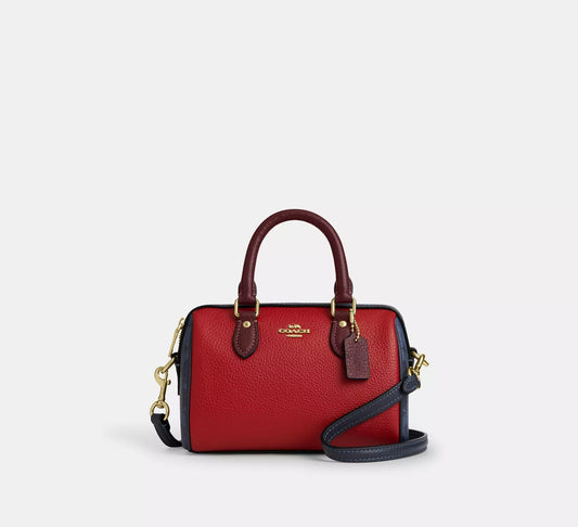 Mini Rowan Crossbody Bag In Colorblock Signature Canvas Denim Bold Red Coach