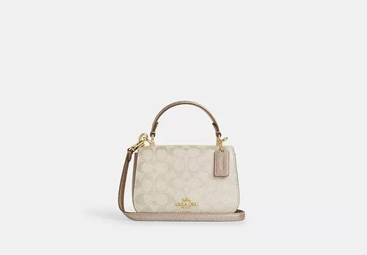 Lysa Top Handle Bag In Signature Canvas Champagne Coach