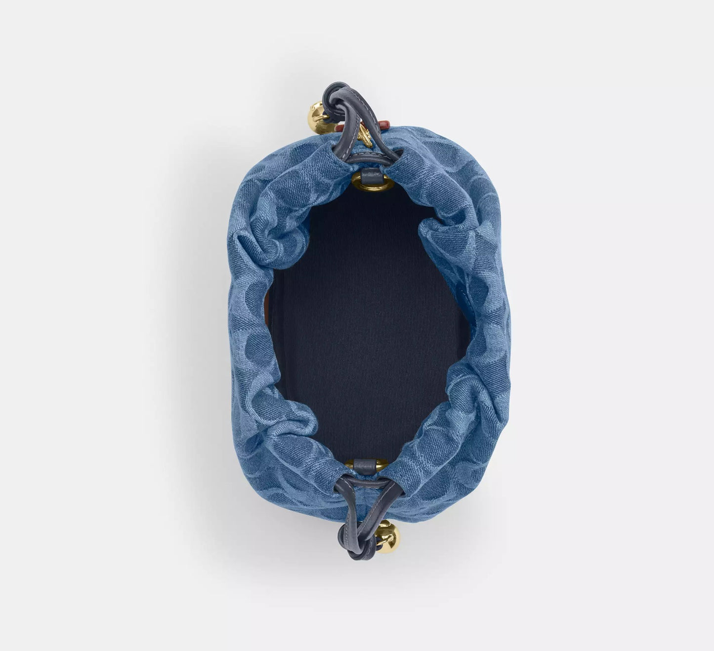 Faye Mini Drawstring Bag In Signature Denim Indigo Coach