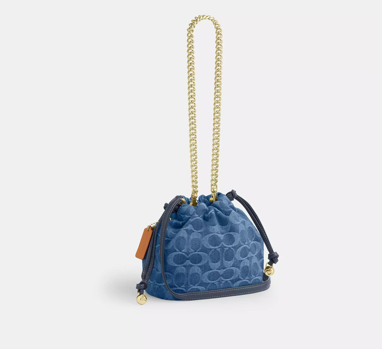 Faye Mini Drawstring Bag In Signature Denim Indigo Coach
