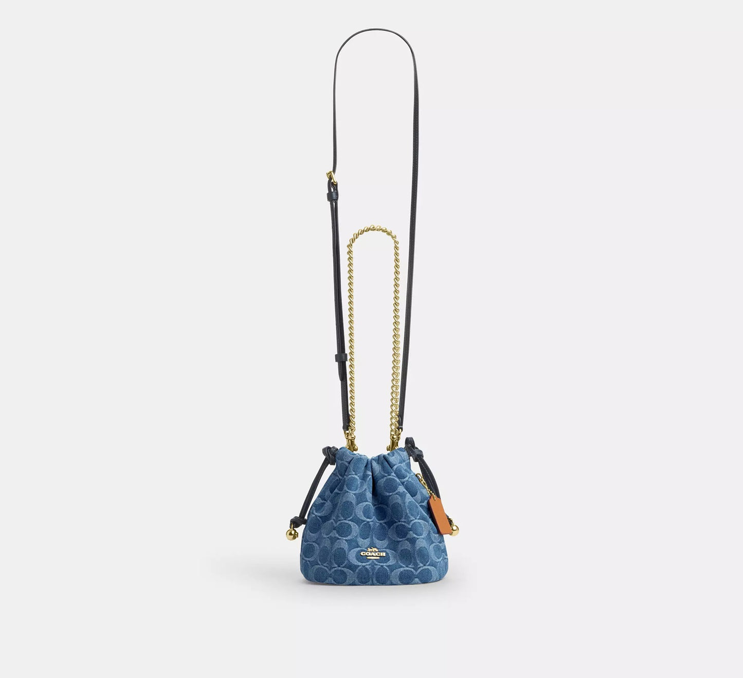 Faye Mini Drawstring Bag In Signature Denim Indigo Coach