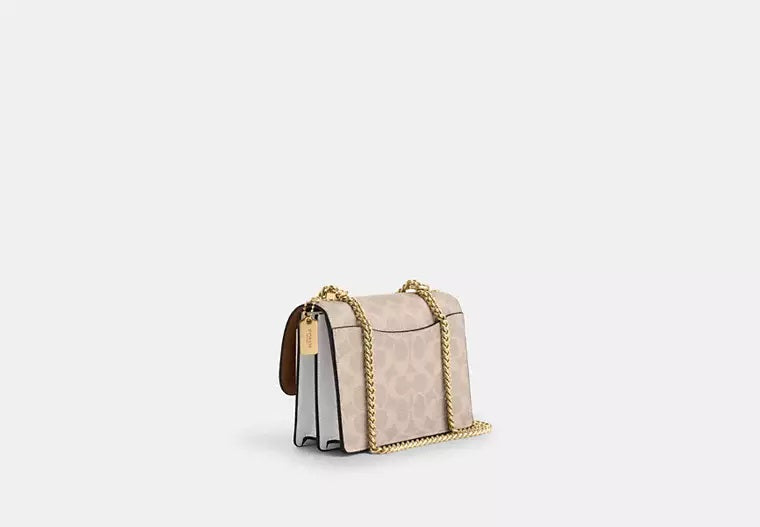 Mini Klare Crossbody Bag In Signature Canvas Sand Chalk Coach