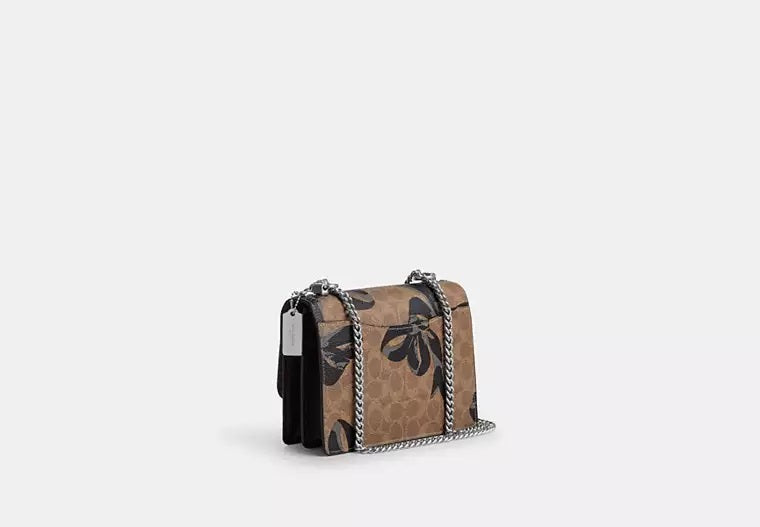 Klare Crossbody Bag In Signature Canvas With Bow Print Black Multi Coach