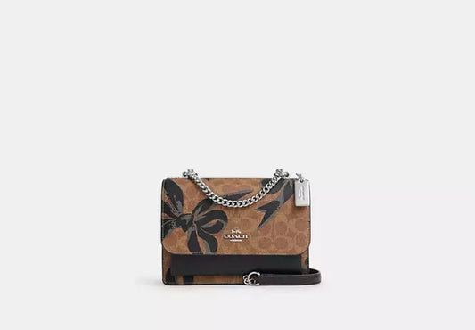 Klare Crossbody Bag In Signature Canvas With Bow Print Black Multi Coach