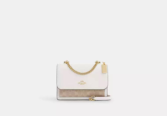 Klare Crossbody Bag In Signature Canvas Sand Chalk Coach