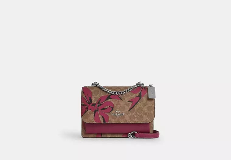 Klare Crossbody Bag In Signature Canvas With Bow Print Pink Multi Coach