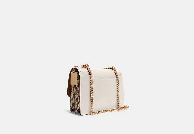 Klare Crossbody Bag In Signature Canvas With Rivets Light Khaki Multi Coach