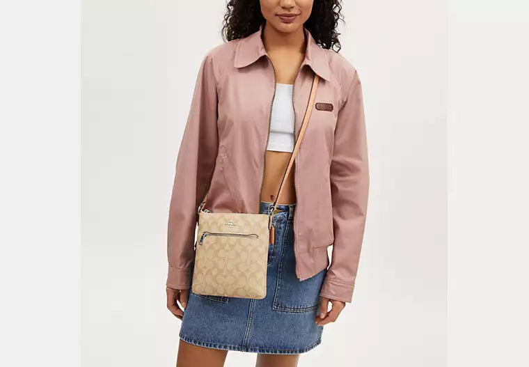 Mini Rowan File Bag In Signature Canvas Faded Blush Coach