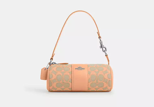 Nolita Barrel Bag In Signature Jacquard Faded Blush Coach