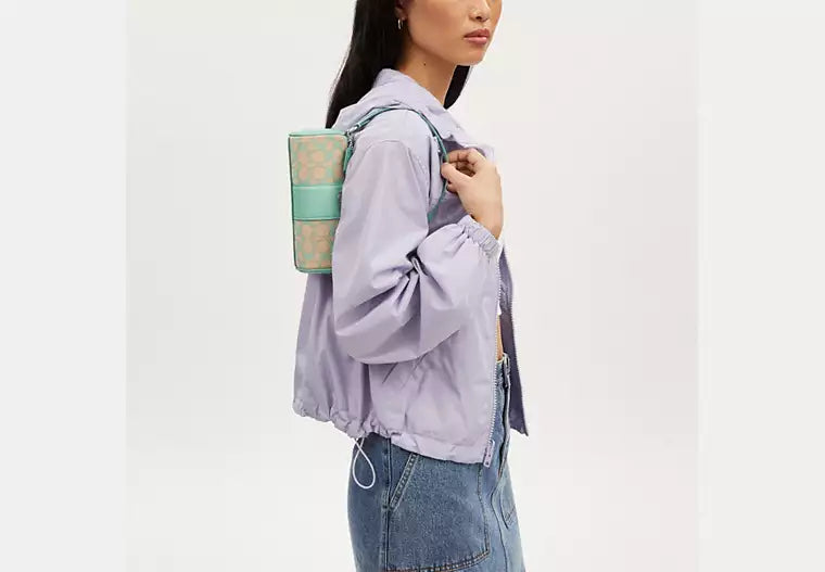 Nolita Barrel Bag In Signature Jacquard Faded Blue Coach