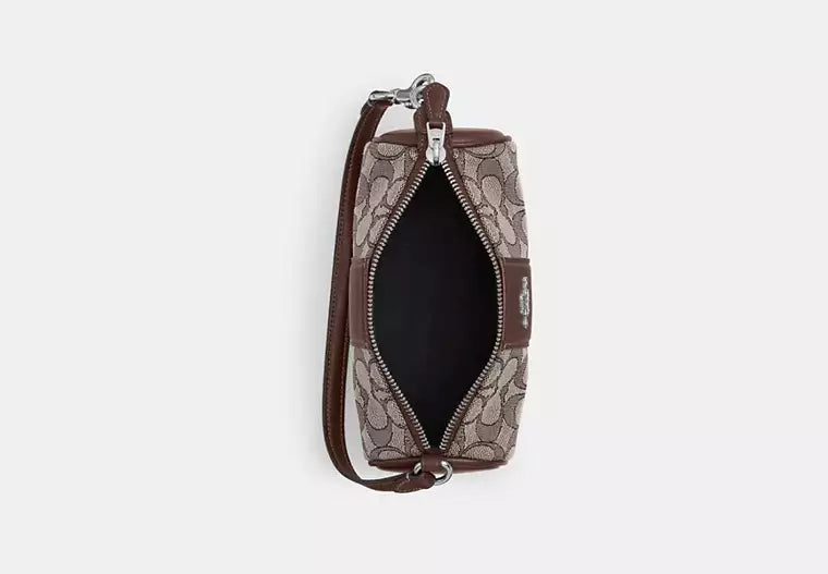 Nolita Barrel Bag In Signature Jacquard Oak Coach