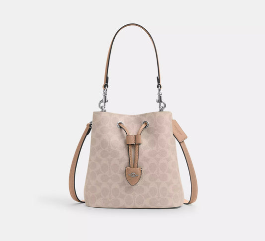 Rowan Bucket Bag In Signature Canvas Sand Taupe Coach