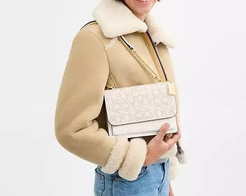 Klare Crossbody Bag With Signature Rivets Chalk Coach