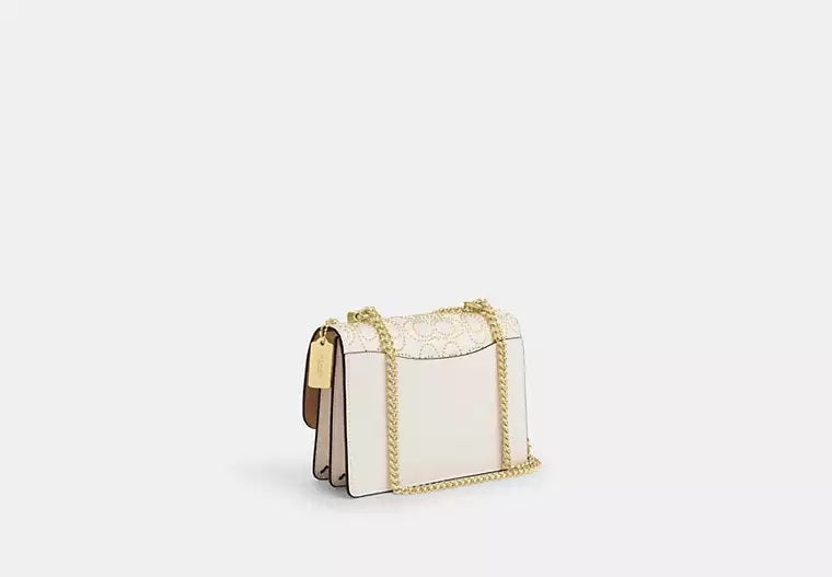 Klare Crossbody Bag With Signature Rivets Chalk Coach